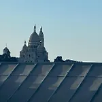 A Duplex With A Sacre Coeur\'S View